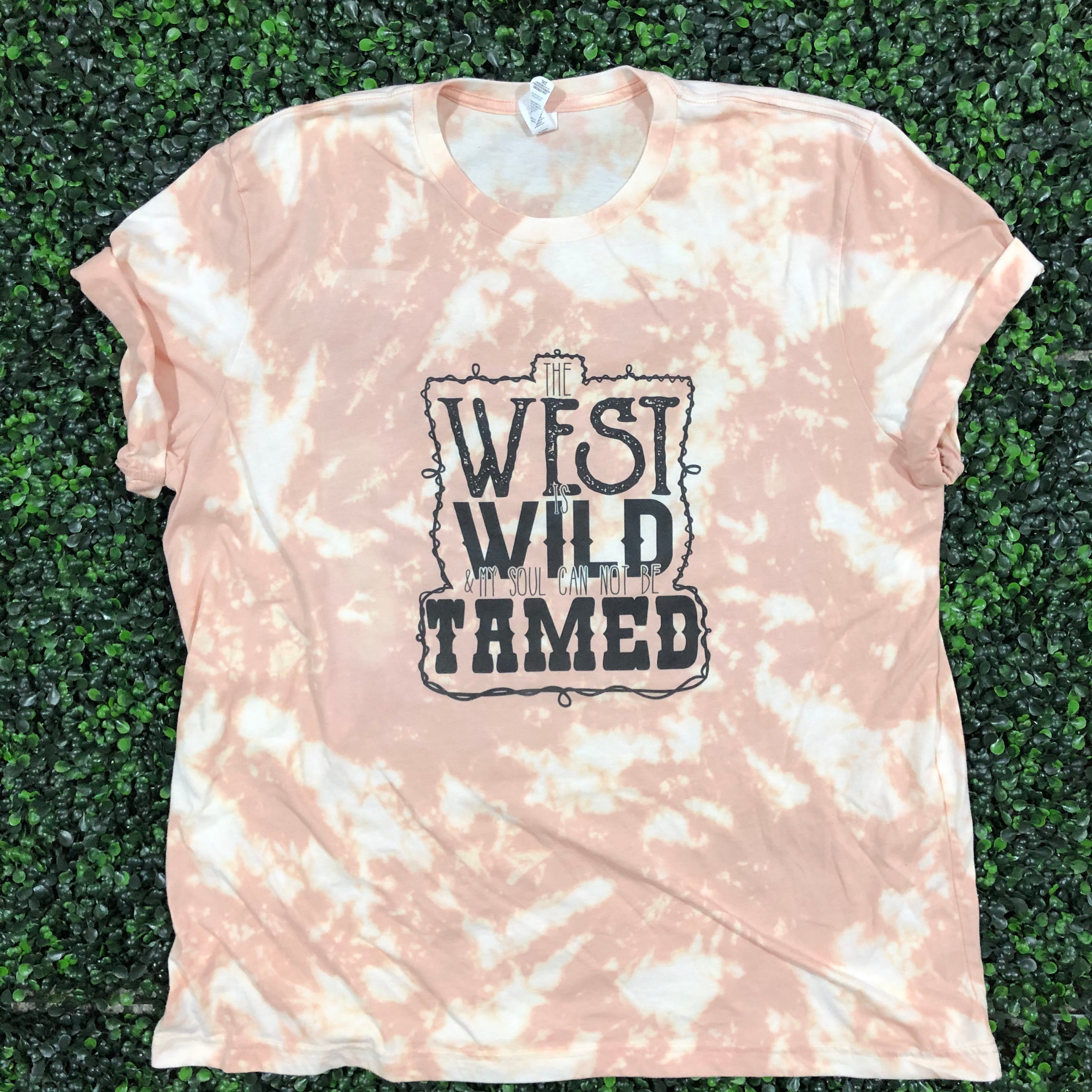 West, Wild, Tamed Top Design